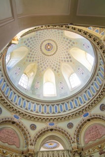 View of the ornately painted interior ceiling with detailed patterns and windows, Mosque,