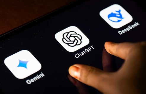 In this photo Illustration a person taps ChatGPT app icon on a tablet device on 24 May 2025 in New