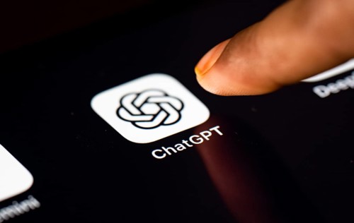 In this photo Illustration a person taps ChatGPT app icon on a tablet device on 24 May 2025 in New