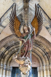 Tower porch with statue of St Michael the Archangel. Protestant parish church of St Michael. As