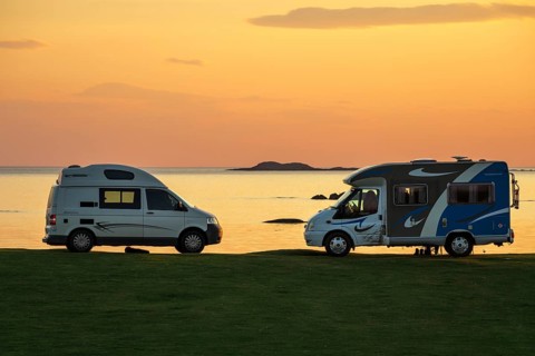 Camper vans at the coast, sunset, campsite Fidden, Isle of Mull, Scotland, UK