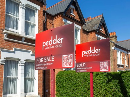 Estate agent property signs outside houses for sale, Barry Road, East Dulwich, London SE22,