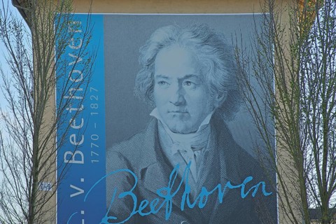 Portrait of the composer Ludwig van Beethoven on a block of flats with signature and year,