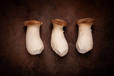Fresh eringi mushrooms, raw, royal oyster mushrooms, three pieces, Asian cuisine, no people