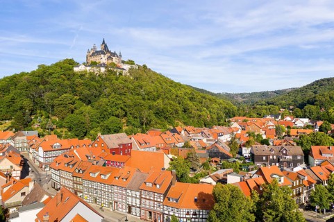 Aerial view of the district Nöschenrode with castle, in the foreground half-timbered houses Schöne