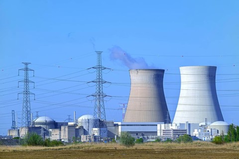 Cooling towers of the Doel Nuclear Power Station, nuclear power plant and high-voltage electricity