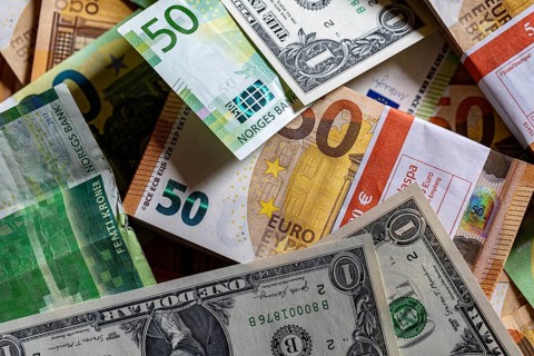 Close-up, banknotes, euro, US dollar, Norwegian krone. euro also in bundles