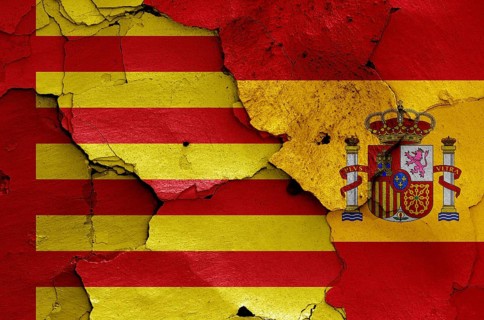 Flags of Sagunto and Spain painted on cracked wall