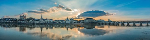 A panorama of Saumur focused on the river Loire and its landmarks