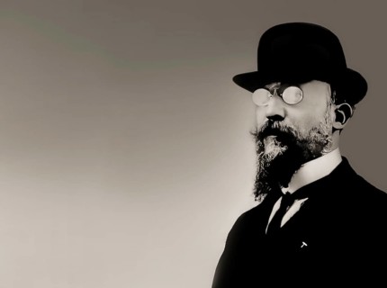 Erik Satie, 1866 – 1925, a French composer and pianist, portrait digitally edited according to a