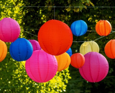 Party with colourful lampions hanging in the garden