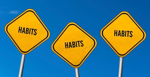 Habits, yellow signs with blue sky