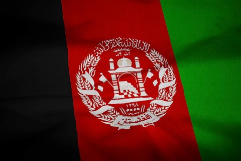 Ruffled Flag of Afghanistan Blowing in Wind