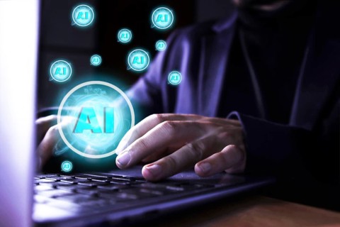 Close up of a man using a computer with artificial intelligence icons. use of artificial
