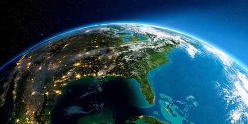 Highly detailed Earth with atmosphere, exaggerated relief and light-flooded cities. Transition from