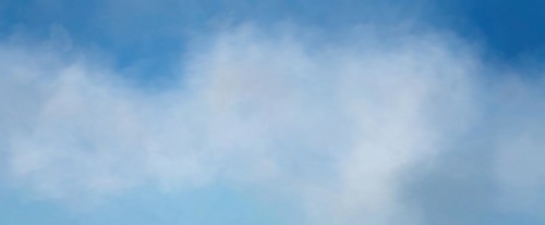 Surreal Blurred Abstract Art Colorful Background, sky with clouds as blurred background