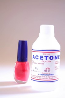 Acetone spirit nailpolish remover on white background