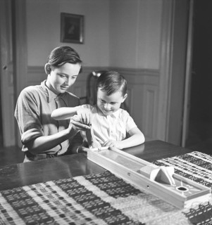 Children play games in the 1940s. In the absence of television and the Internet, the children of