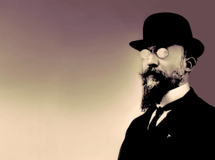 Erik Satie, 1866 – 1925, a French composer and pianist, portrait digitally edited according to a