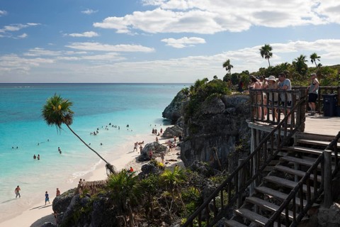 Tourists at the Mayan ruins of Tulum, Riviera Maya, Yucatan Peninsula, Mexico