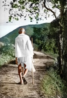 Mahatma Gandhi walking with stick, India, 1937