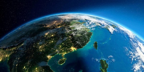 Highly detailed Earth with atmosphere, exaggerated relief and light-flooded cities. Transition from