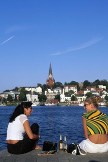 Two girls at the harbour of Flensburg, Schleswig-Holstein, Germany