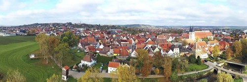 This aerial photo shows the picturesque town of Herrieden. At the centre are the red roofs of the