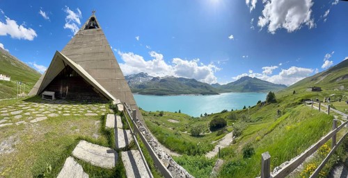 View of the Mont-Cenis Pyramid Museum on the left, built in 1967 above Lac du Mont Cenis on the
