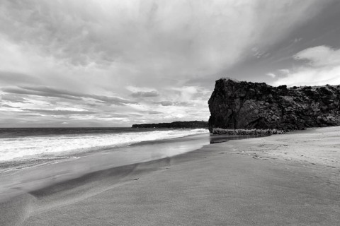 Skarðsvík Beach, sandy beach and cliffs, coastal landscape with bay, monochrome, Skardsvik,