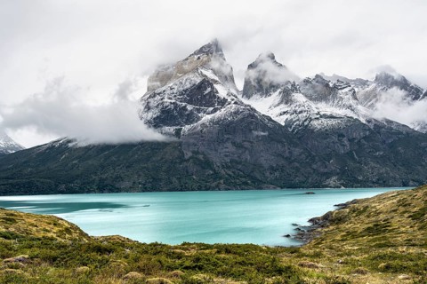 Blue lake Lago Nordenskjöld, Cuernos del Paine mountain range in autumn, Torres del Paine National