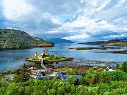 Eilean Donan Castle and Loch Duich from a drone, Isle of Skye, Highlands, Scotland, England, United