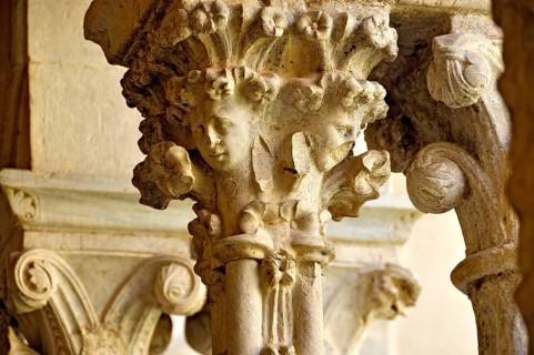 Slender Gothic columns with filigree capitals in the cloister, Gothic basilica of the Cistercian