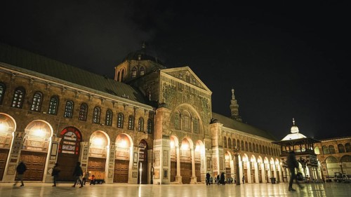 A night photo of the famous Umayyad Mosque in Damascus