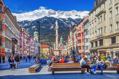 Pedestrian zone Maria-Theresien-Strasse with the Annasäule in front of the Nordkette of the