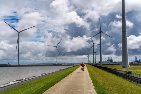 Strekdammen Wind Farm, wind farm at the seaport of Eemshaven in the Netherlands, left, built on