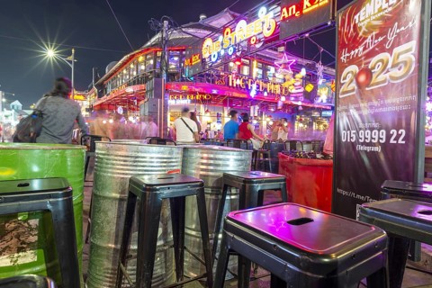 Neon lights, the legendary restaurant THE RED PIANO, Pub Street in the evening, entertainment