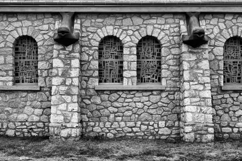 Side view, decorations, fish heads as gargoyles, church Chapelle Notre Dame de la Garde, black and