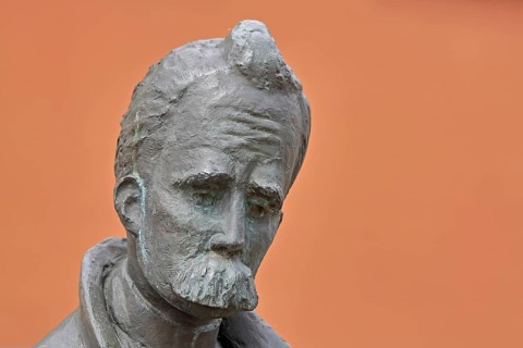 Monument to philosopher Friedrich Nietzsche, bronze sculpture, modern art, man with beard, head,