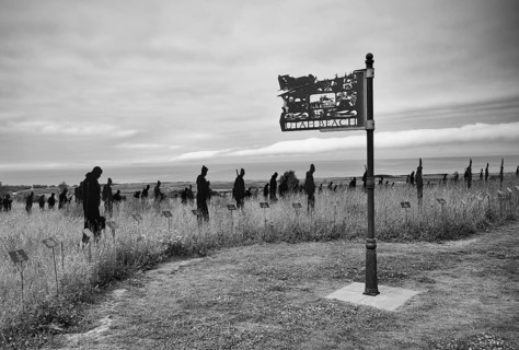 Installation, sign Utah Beach, Standing with Giants, honours the victims of the fallen British
