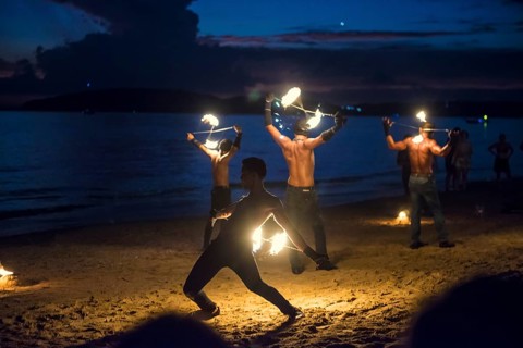 Fire show, jugglers with fire, Ao Nang Beach, sunset, Ao Nang, Krabi, Thailand