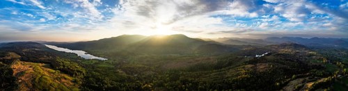 Panorama of Sunset over Mountains and Coniston Water from drone, Lake District National Park,