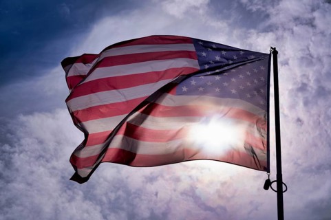 US flag, national flag USA, flies over National Guard memorial, memorial for US soldier Sgt. Frank