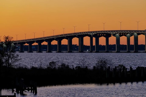 Bay St. Louis Bridge passes behind an inlet at Henderson Point in Pass Christian, Mississippi, USA