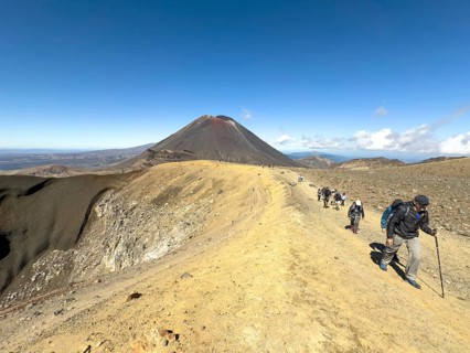 On the hiking trail of the Tongariro Alpine Crossing in Tongariro National Park with a view of the