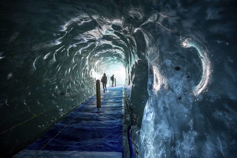 Artificial ice cave through the glacier ice, Mer de Glace, Montenvers, Chamonix, Haute-Savoie,