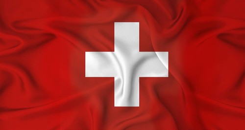 Realistic Switzerland flag waving. Close up of flag of Switzerland with cloth texture