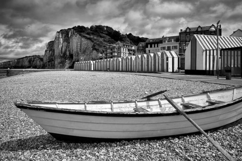 Rowing boat on the beach, pebble beach, beach huts, beach cabins, bathing cabins, cabins, black and