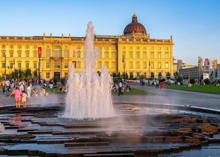 The Lustgarten with fountain and the Humboldt Forum, Berlin, Germany