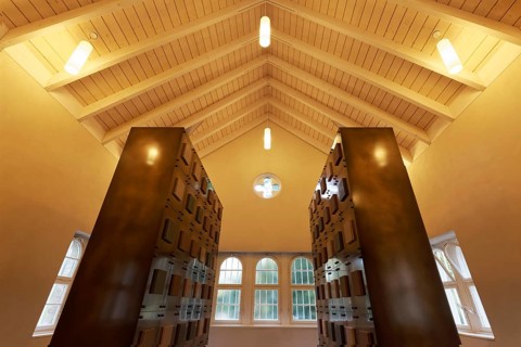 Modern columbarium in the old mourning hall, interior with urn chambers, Cologne Melaten Cemetery,